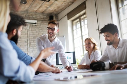 Photo showing a group of people working together and having fun